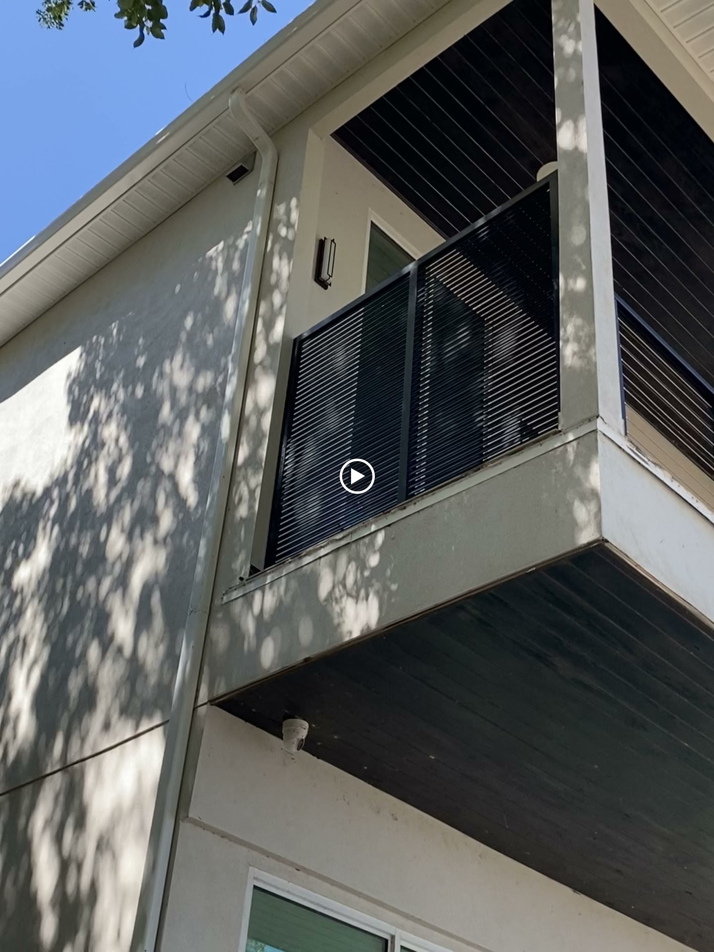 Aluminum Bahama Louver fence installation in Tampa, FL — Vilo Fence