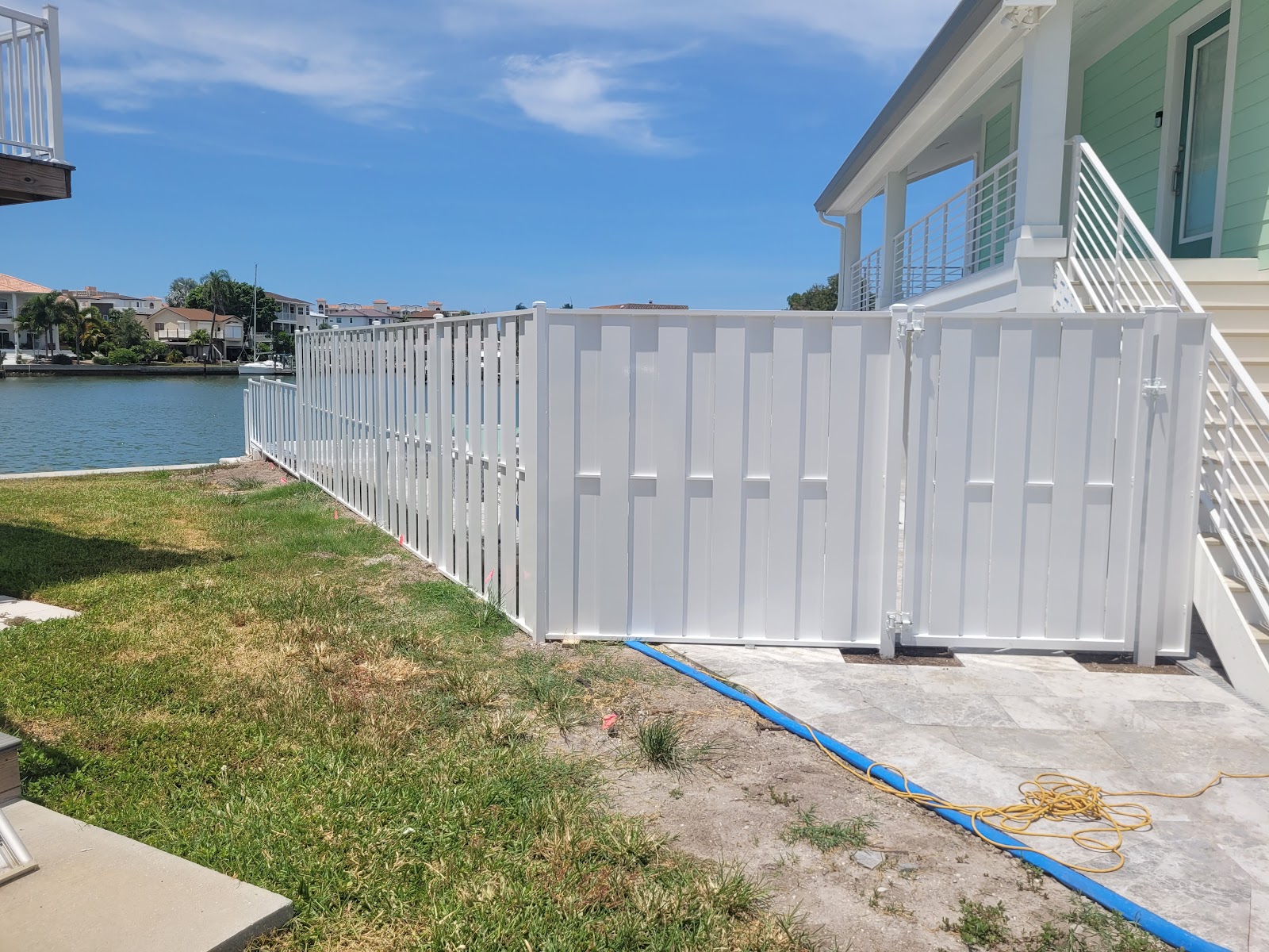 Aluminum Flat Bar Vertical fence installation in Tampa, FL — Vilo Fence