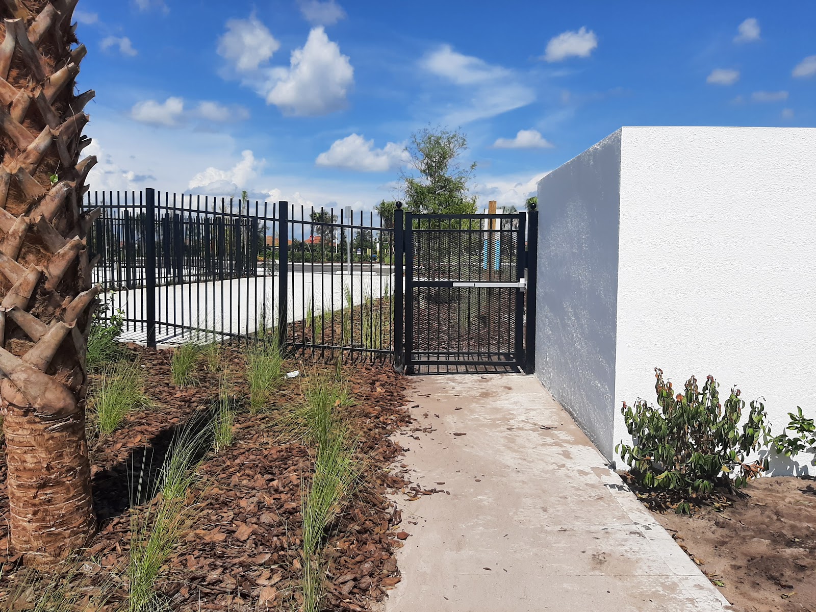 Aluminum Spear Blank fence installation in Tampa, FL — Vilo Fence