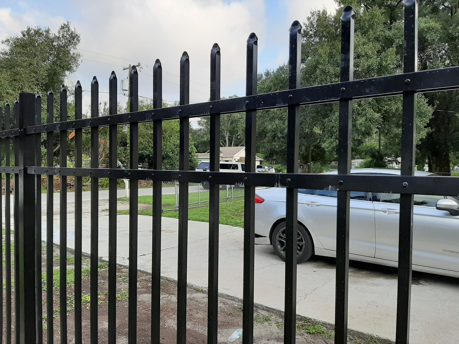 Aluminum Spear Press Point fence installation in Tampa, FL — Vilo Fence