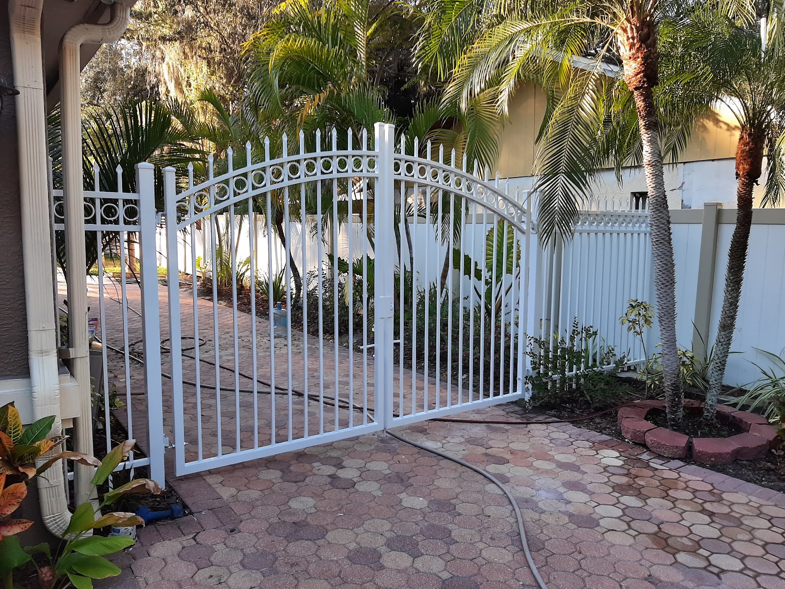 Aluminum Spear Press Point + Circles fence installation in Tampa, FL — Vilo Fence