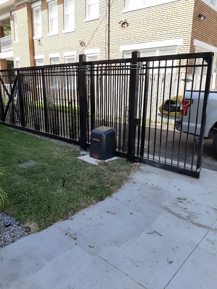 Aluminum Cantilever gates fence installation in Tampa, FL — Vilo Fence