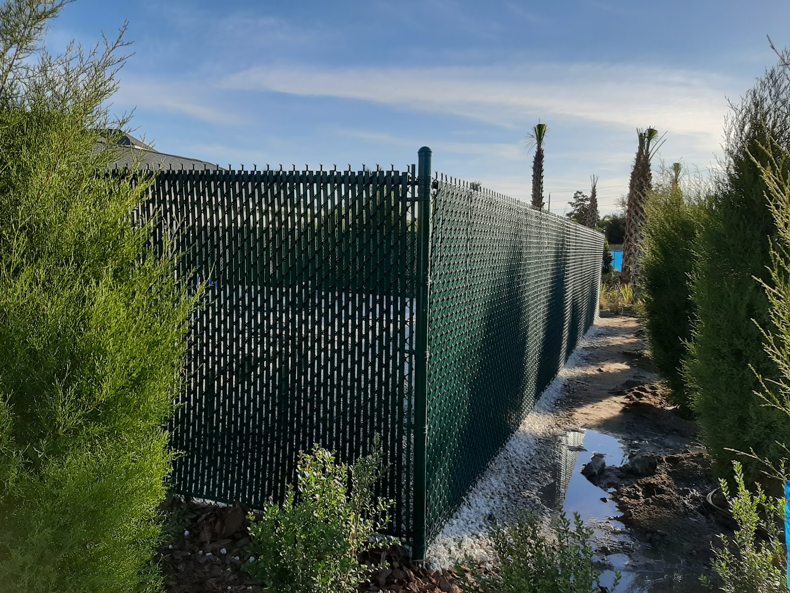 Chain-Link Slats fence installation in Tampa, FL — Vilo Fence