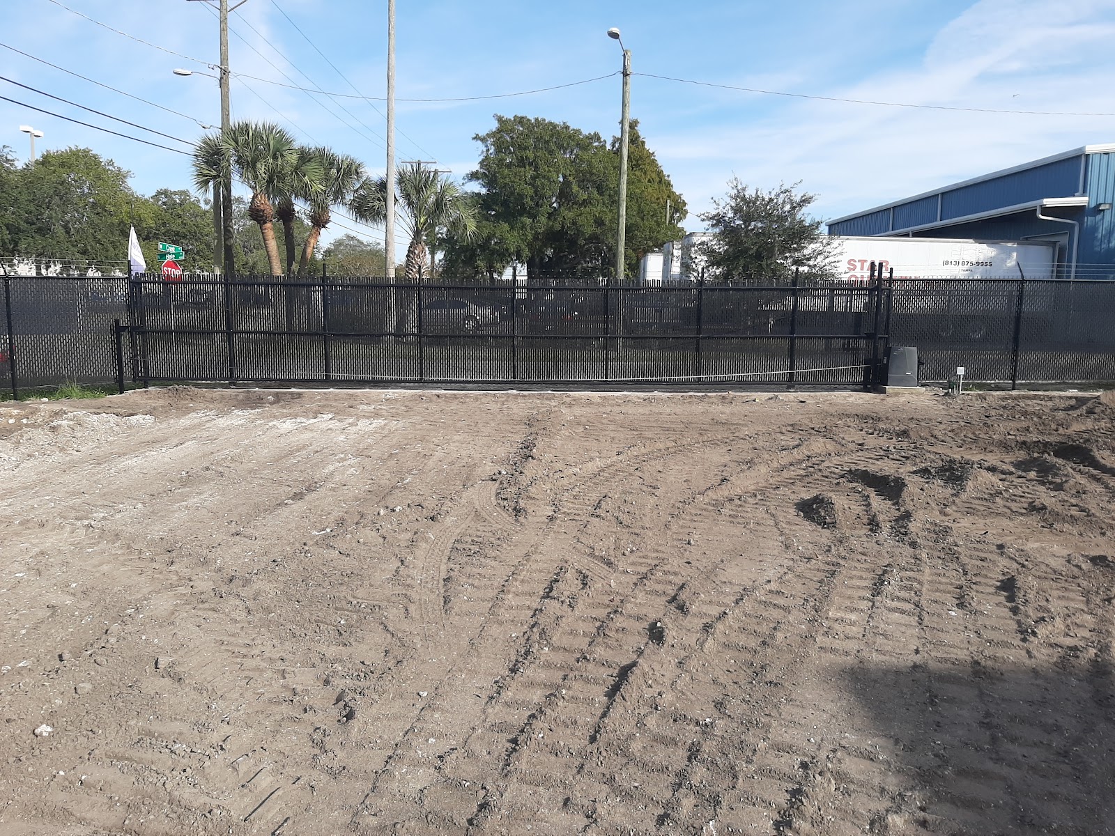 Chain-Link Slats fence installation in Tampa, FL — Vilo Fence