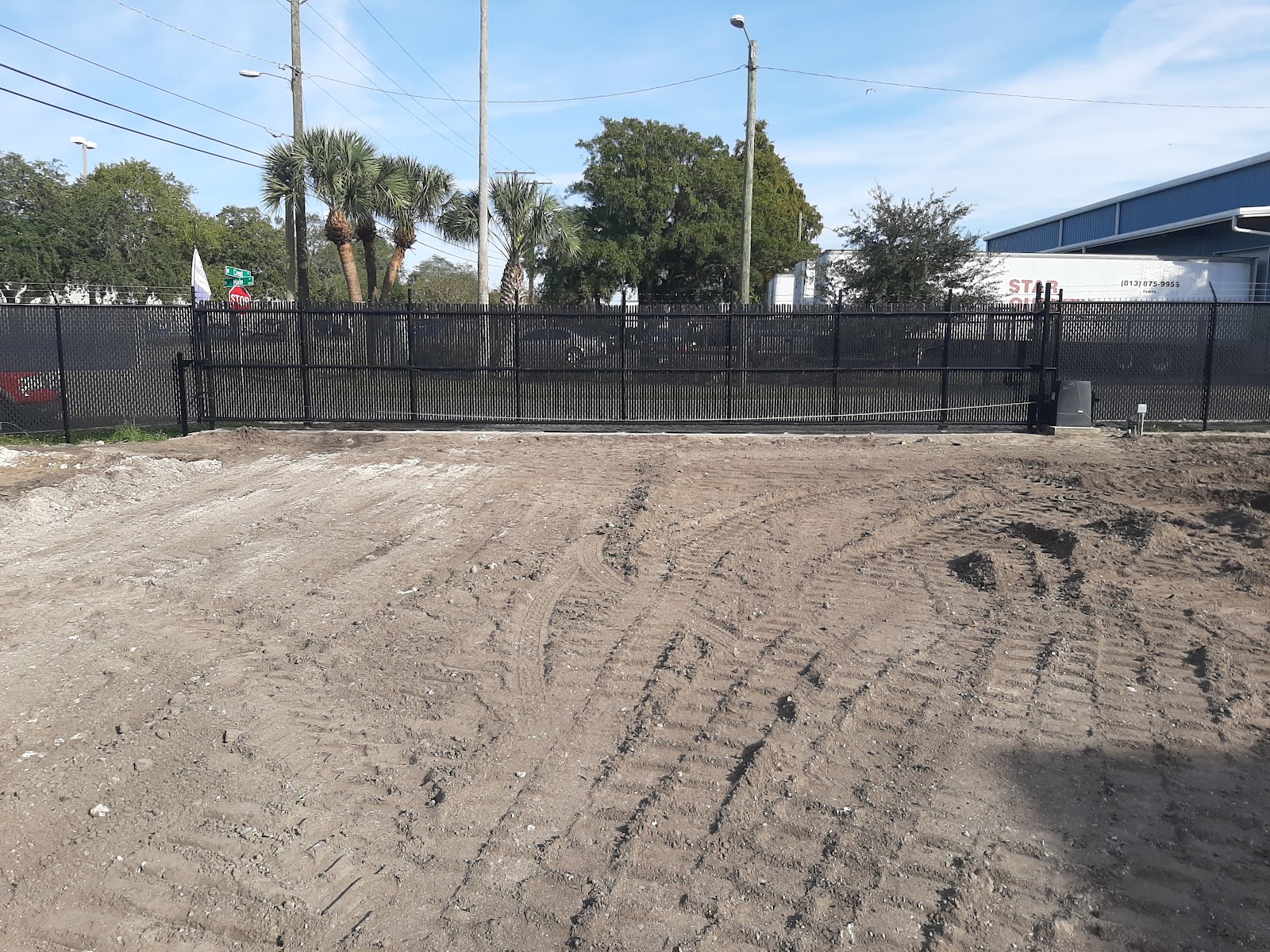 Chain-Link Slats fence installation in Tampa, FL — Vilo Fence