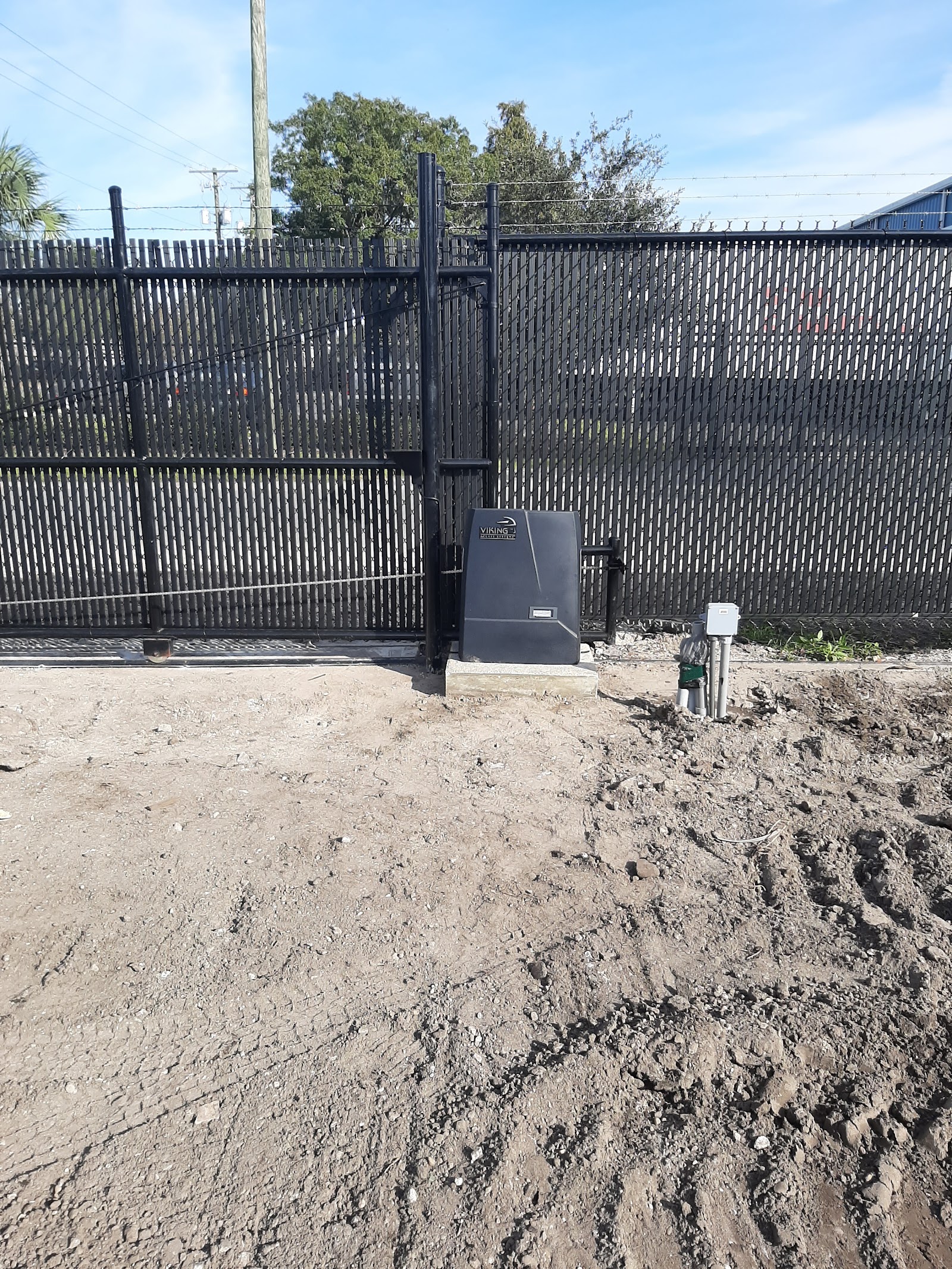 Chain-Link Slats fence installation in Tampa, FL — Vilo Fence