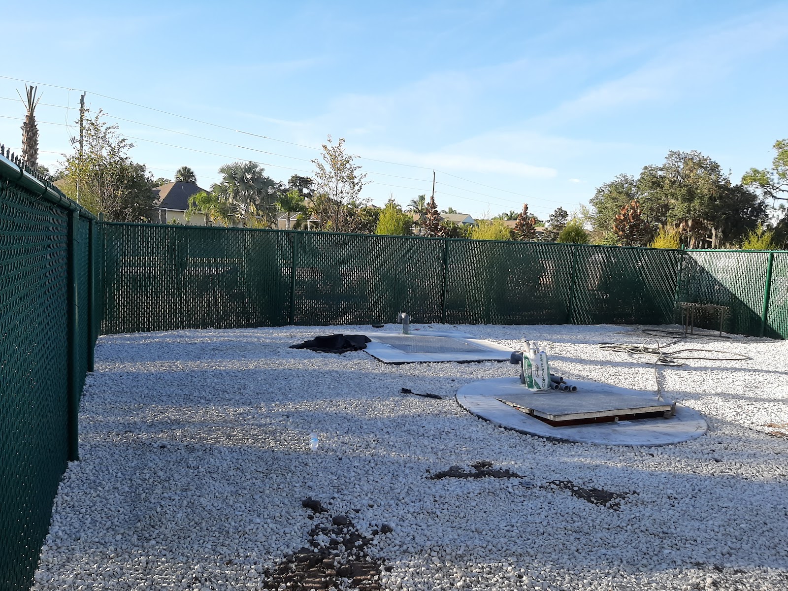 Chain-Link Slats fence installation in Tampa, FL — Vilo Fence