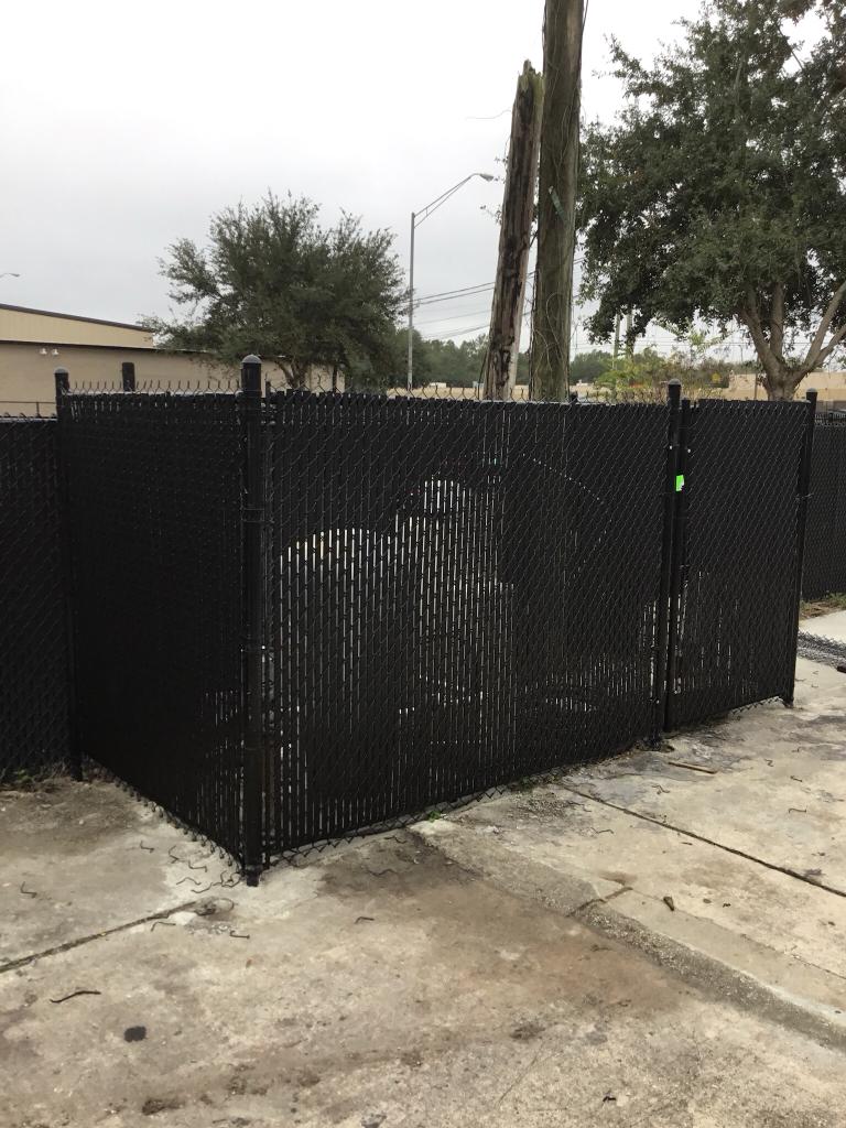 Chain-Link Slats fence installation in Tampa, FL — Vilo Fence