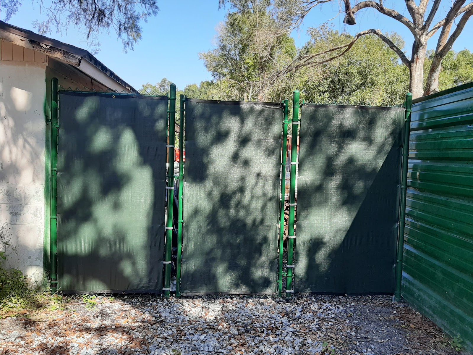 Chain-Link Windscreen fence installation in Tampa, FL — Vilo Fence