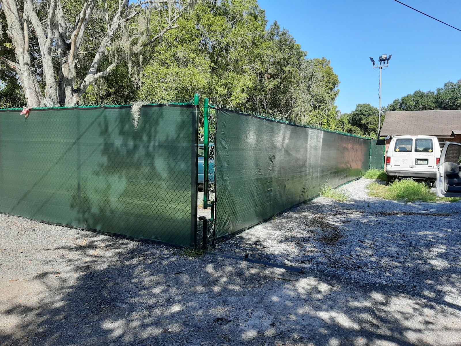 Chain-Link Windscreen fence installation in Tampa, FL — Vilo Fence
