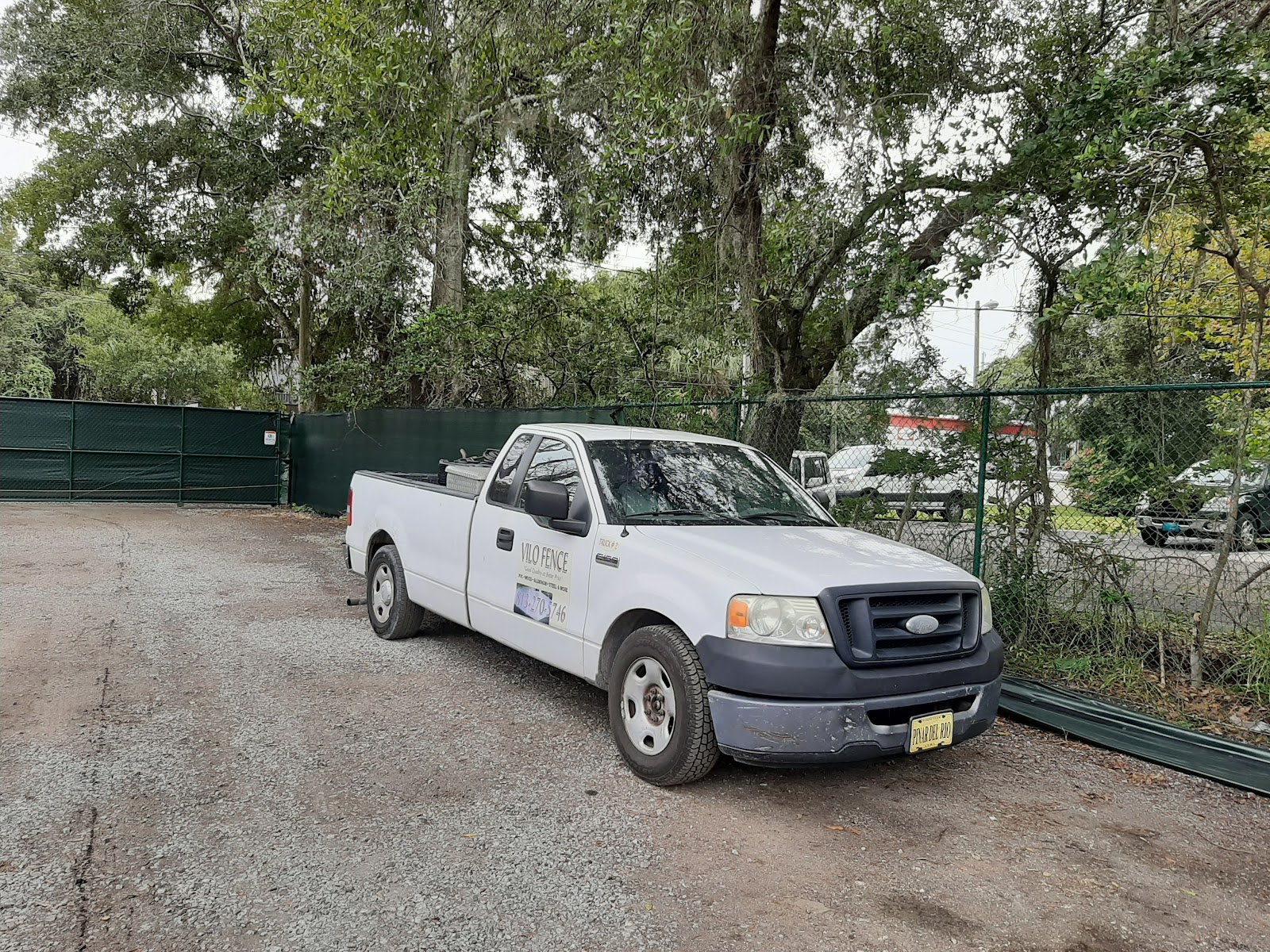 Chain-Link Windscreen fence installation in Tampa, FL — Vilo Fence