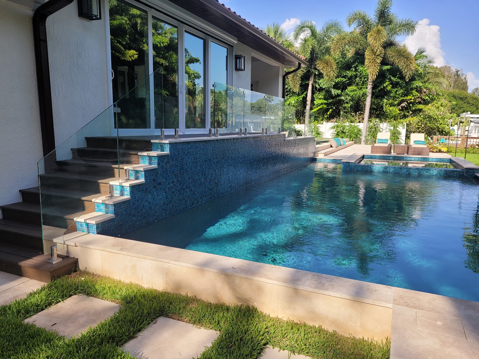 Handrail Glass fence installation in Tampa, FL — Vilo Fence