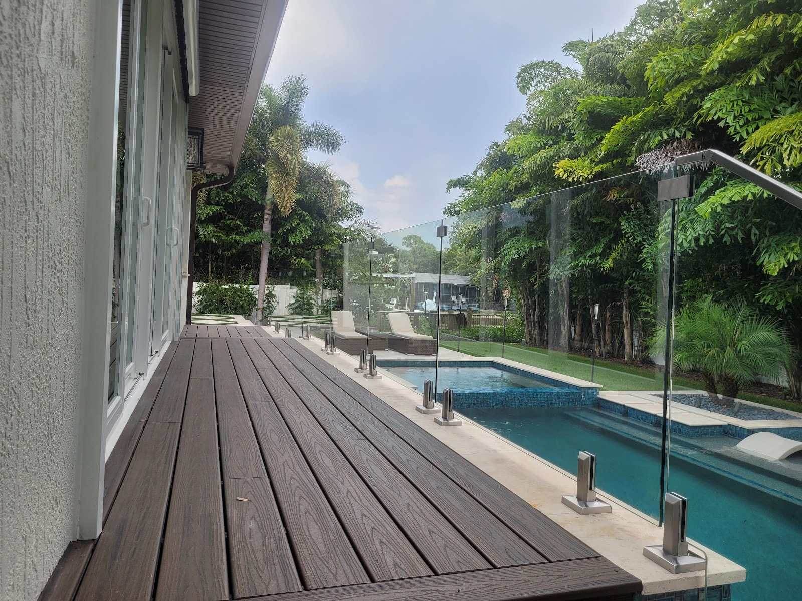 Handrail Glass fence installation in Tampa, FL — Vilo Fence