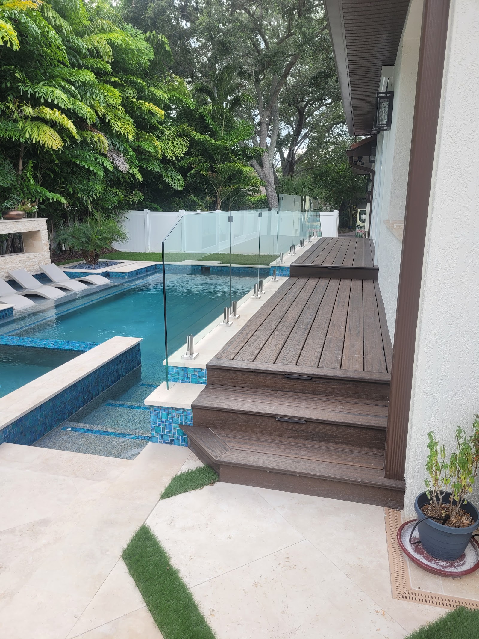 Handrail Glass fence installation in Tampa, FL — Vilo Fence
