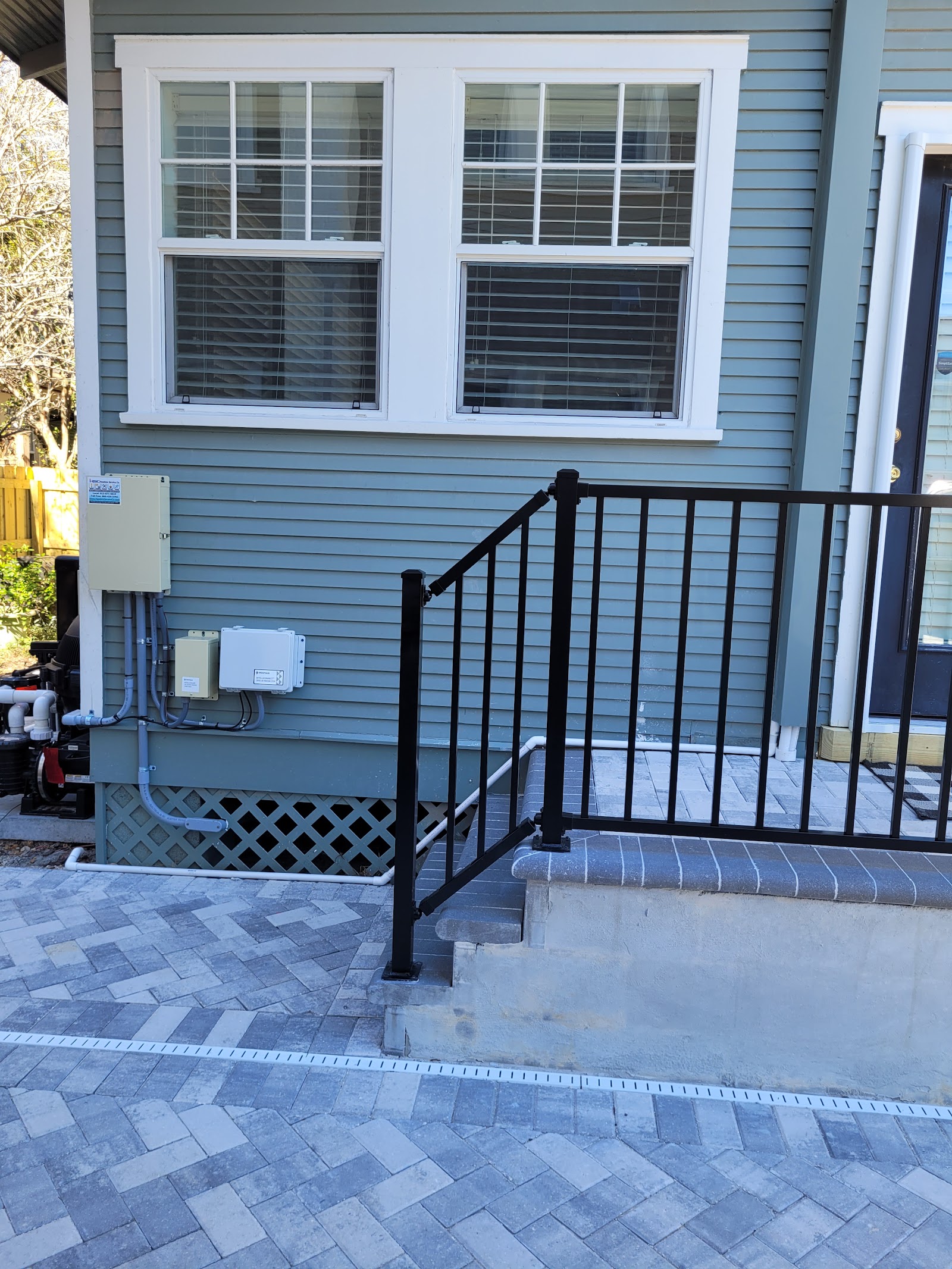Handrail Mechanical fence installation in Tampa, FL — Vilo Fence