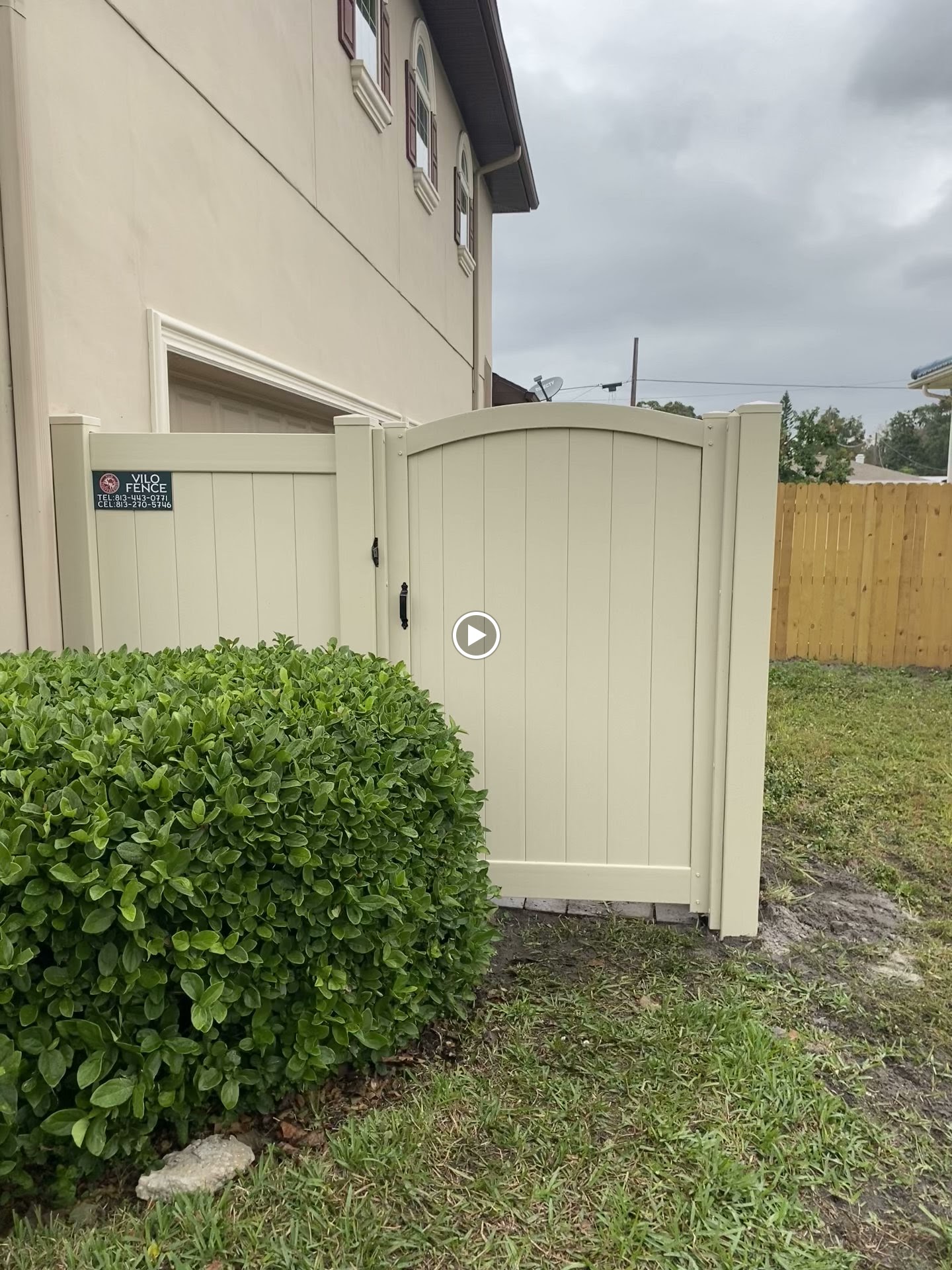 PVC Arched Gates fence installation in Tampa, FL — Vilo Fence