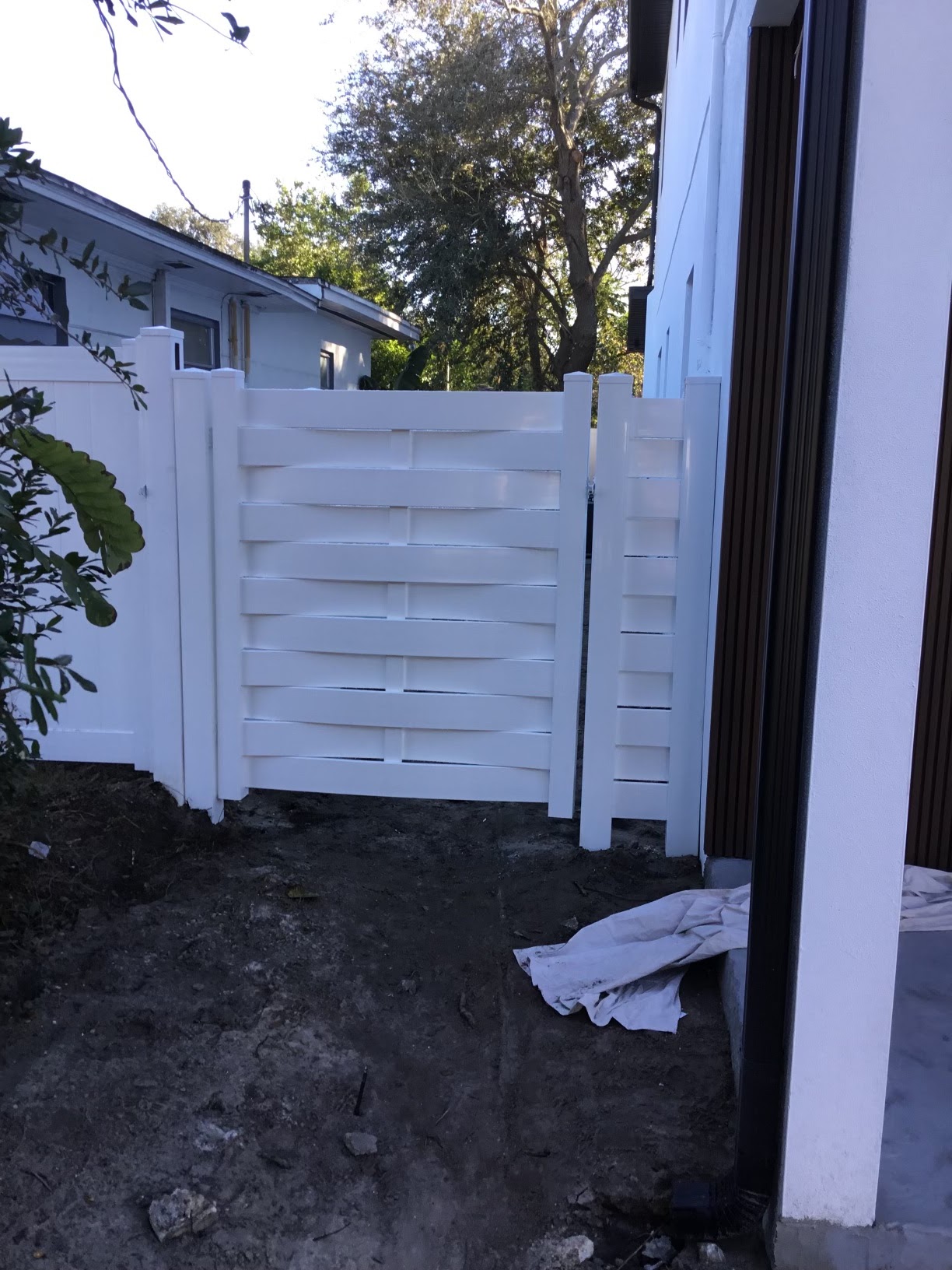 PVC Basket Weave fence installation in Tampa, FL — Vilo Fence