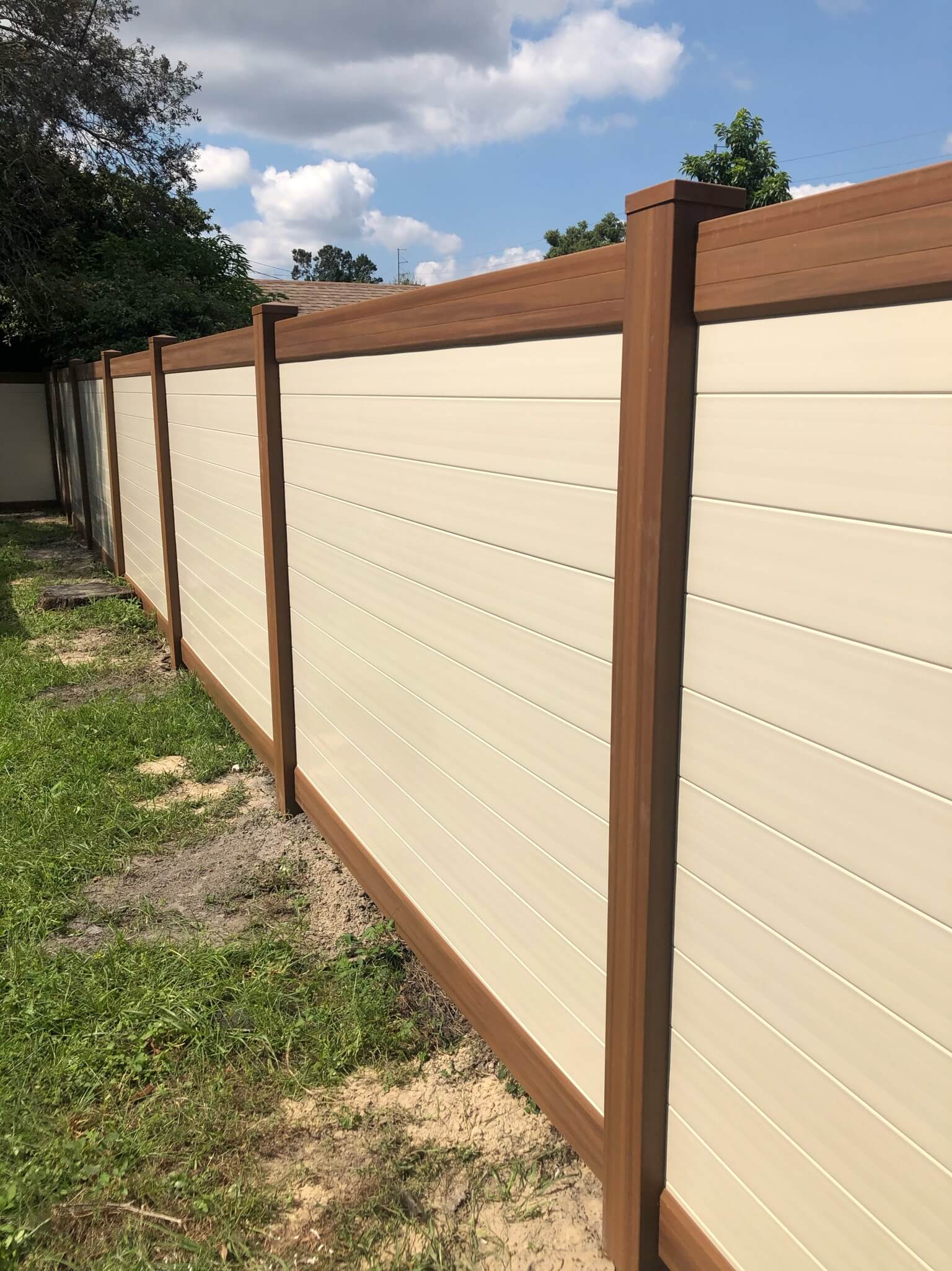 PVC Privacy Horizontal Mocha + Tan fence installation in Tampa, FL — Vilo Fence
