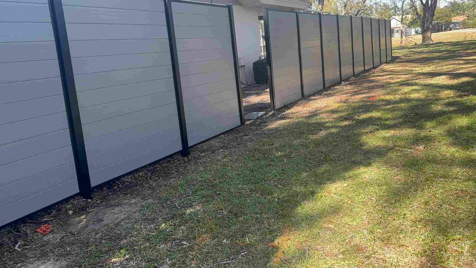 PVC Privacy Horizontal Metal Frame+Dark Gray fence installation in Tampa, FL — Vilo Fence