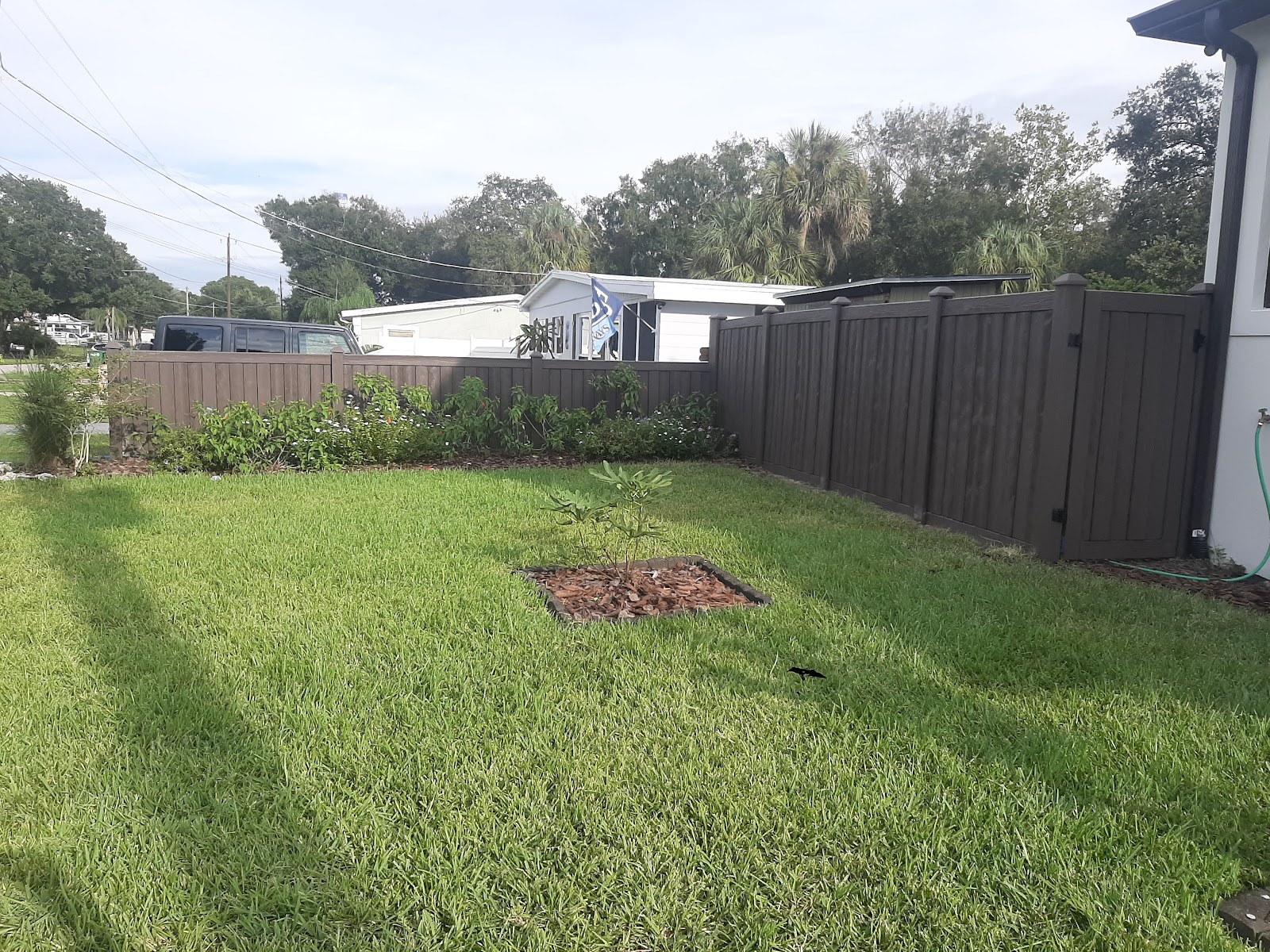 PVC Privacy Simtek Ashland fence installation in Tampa, FL — Vilo Fence