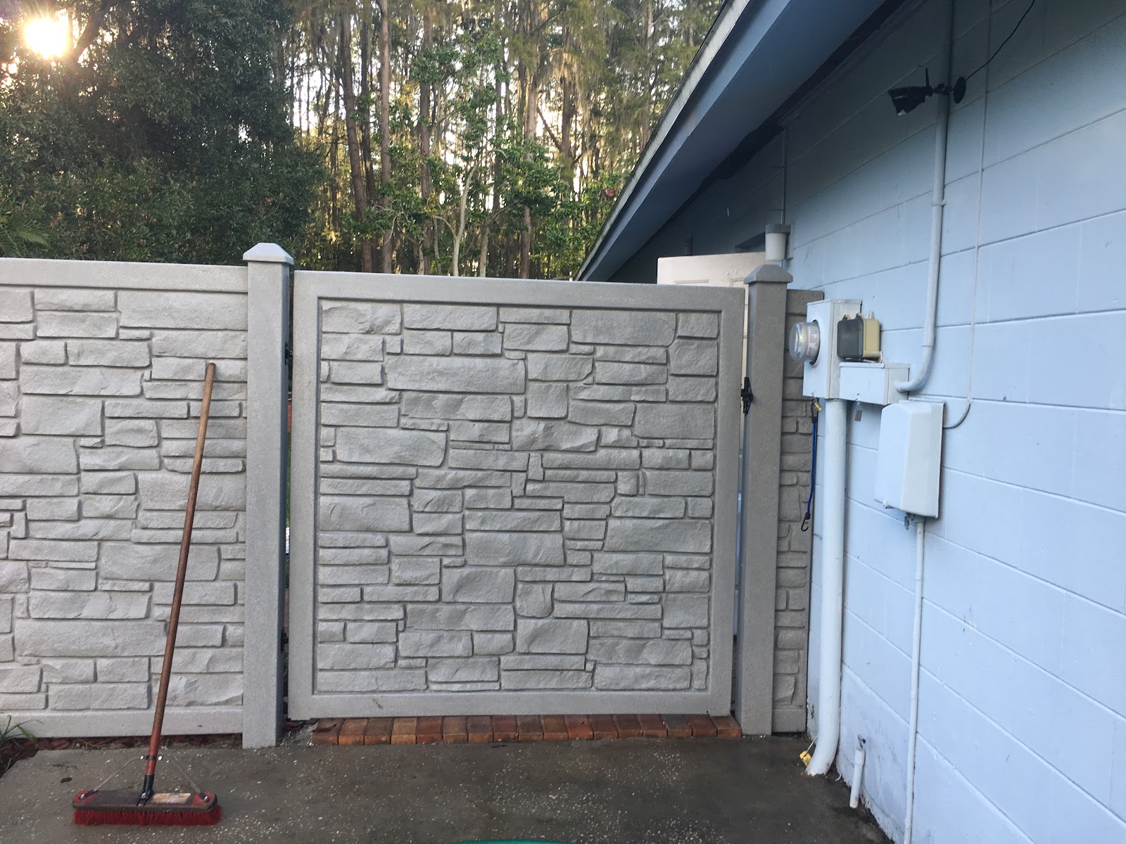 PVC Privacy Simtek Ecostone fence installation in Tampa, FL — Vilo Fence