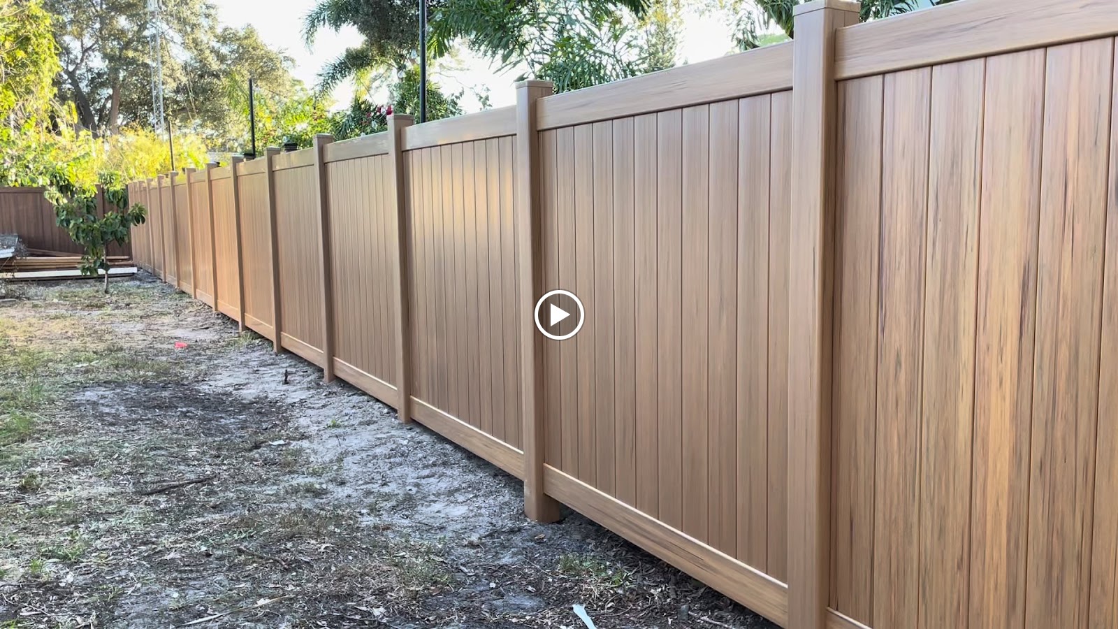 PVC Privacy Woodgrain Cypress fence installation in Tampa, FL — Vilo Fence