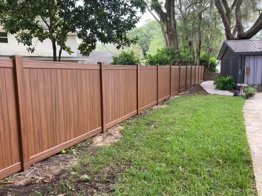 PVC Privacy Woodgrain Mocha fence installation in Tampa, FL — Vilo Fence
