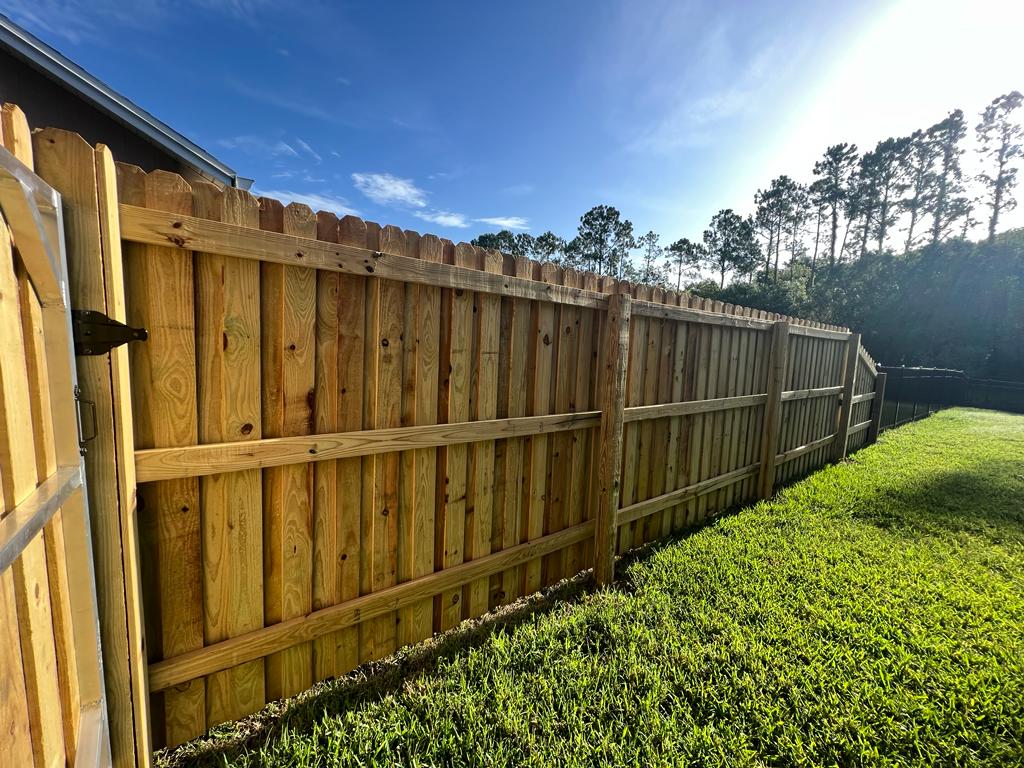 Wood Board on Board fence installation in Tampa, FL — Vilo Fence