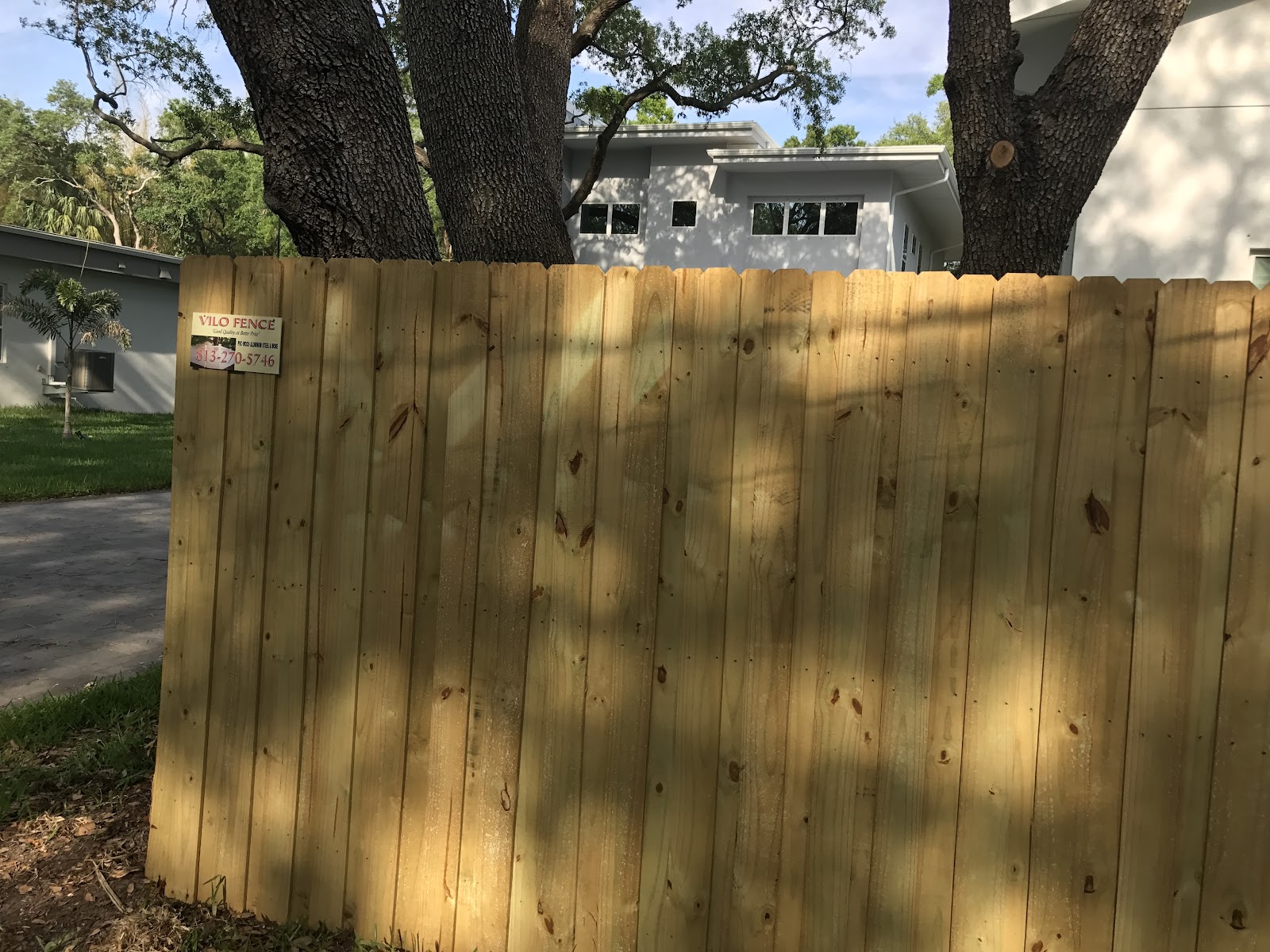 Wood Board on Board fence installation in Tampa, FL — Vilo Fence