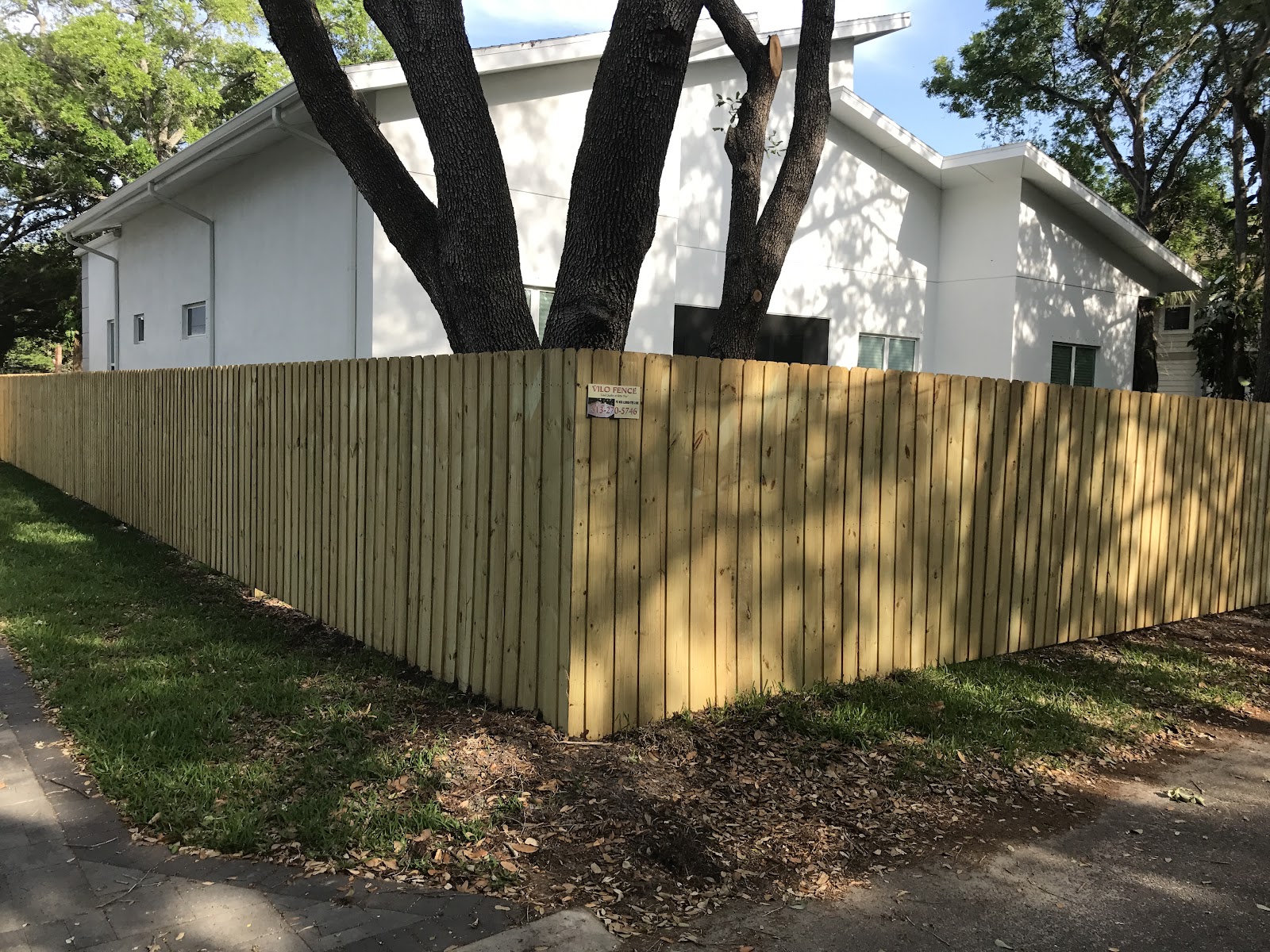 Wood Board on Board fence installation in Tampa, FL — Vilo Fence