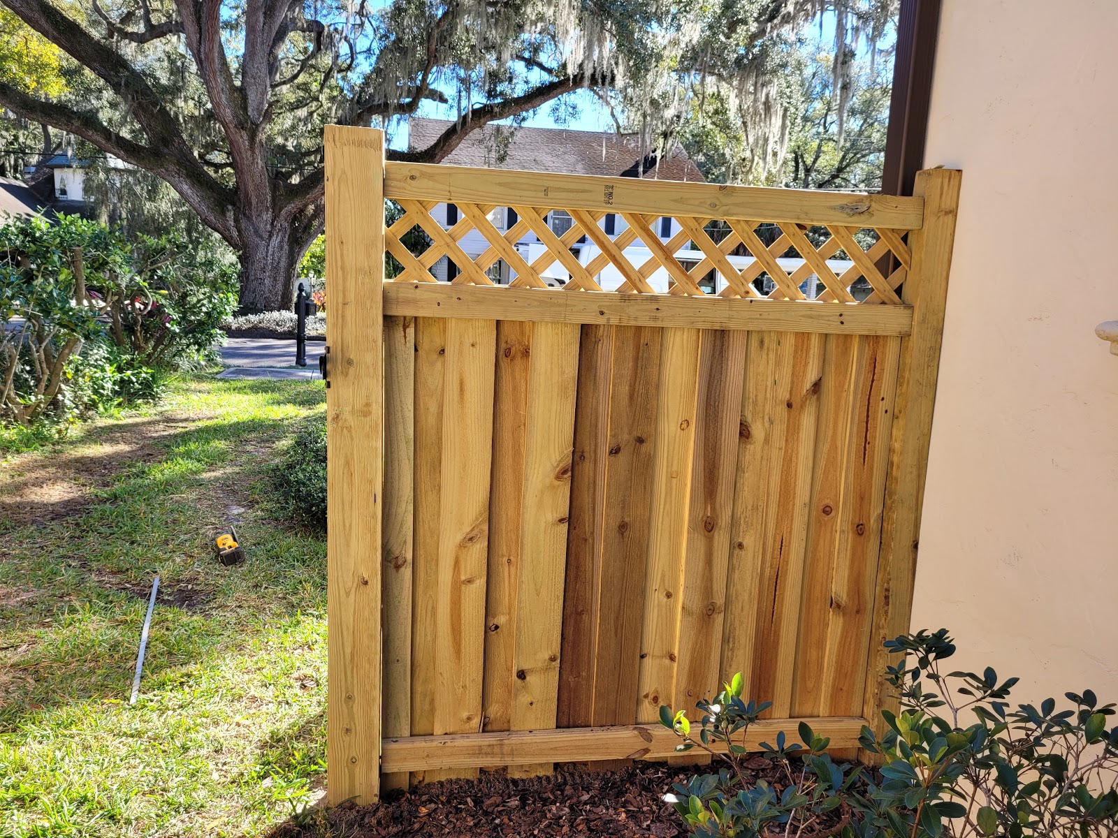 Wood Lattice fence installation in Tampa, FL — Vilo Fence