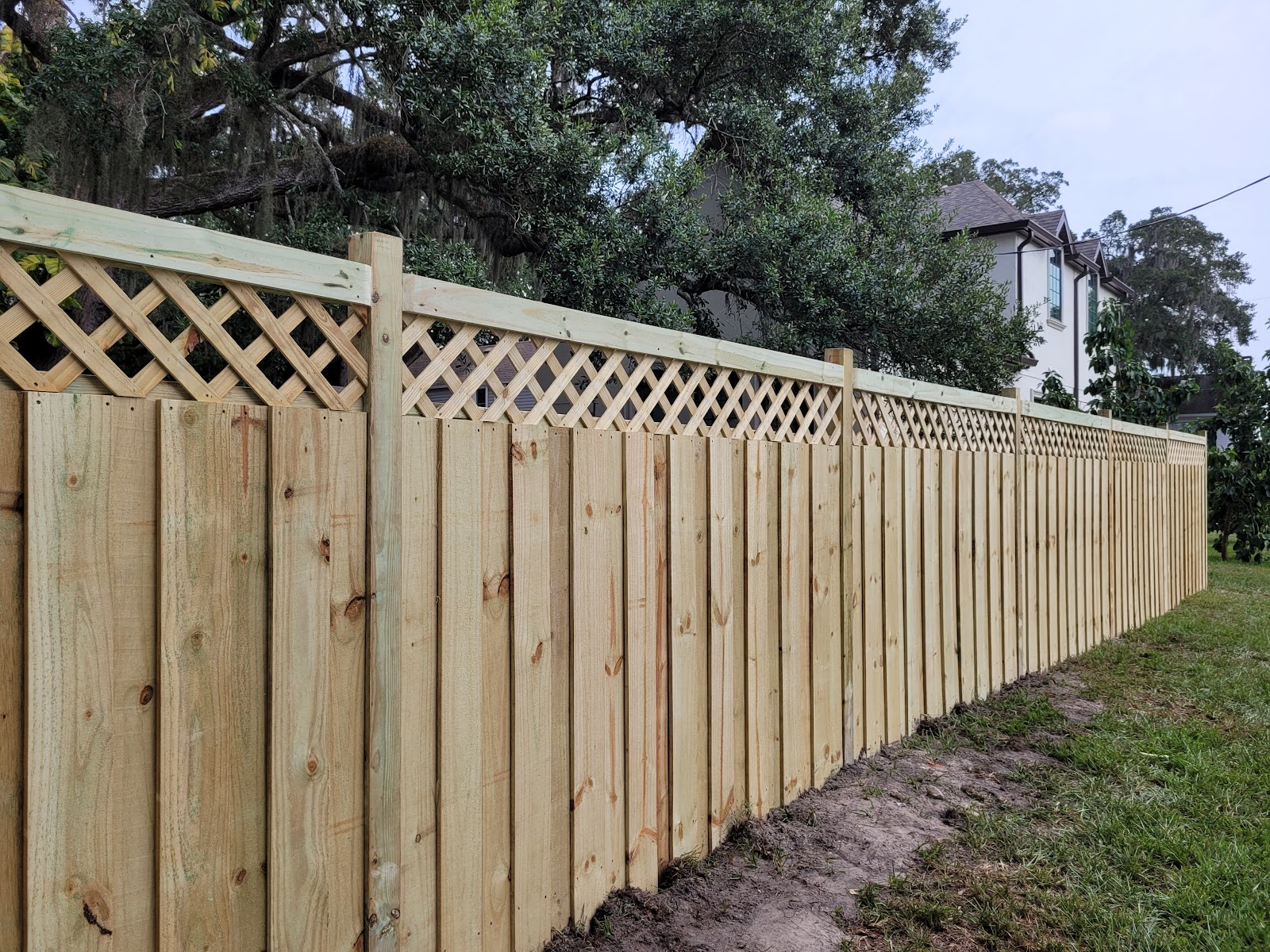 Wood Lattice fence installation in Tampa, FL — Vilo Fence