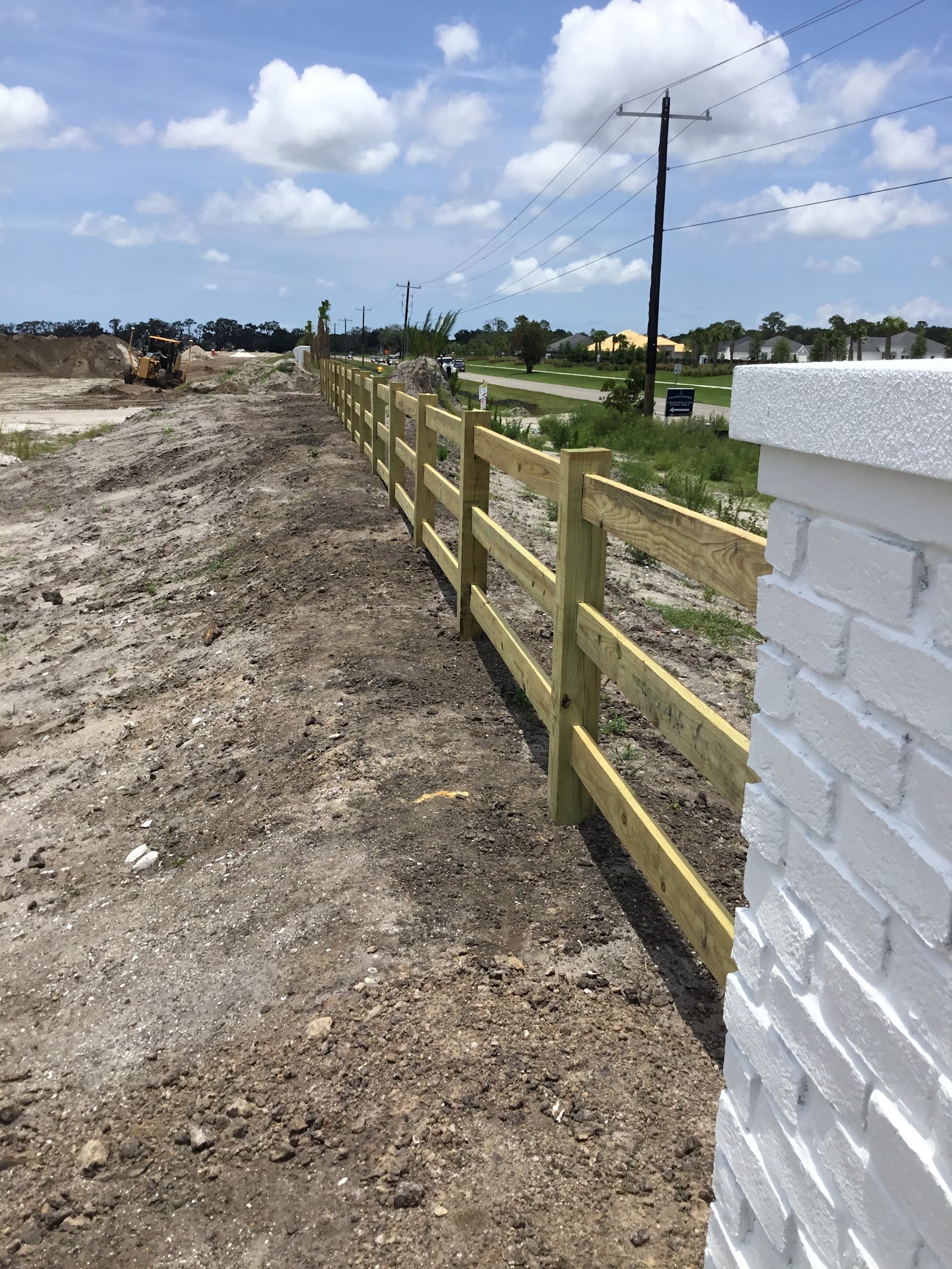 Wood Ranch Rail fence installation in Tampa, FL — Vilo Fence