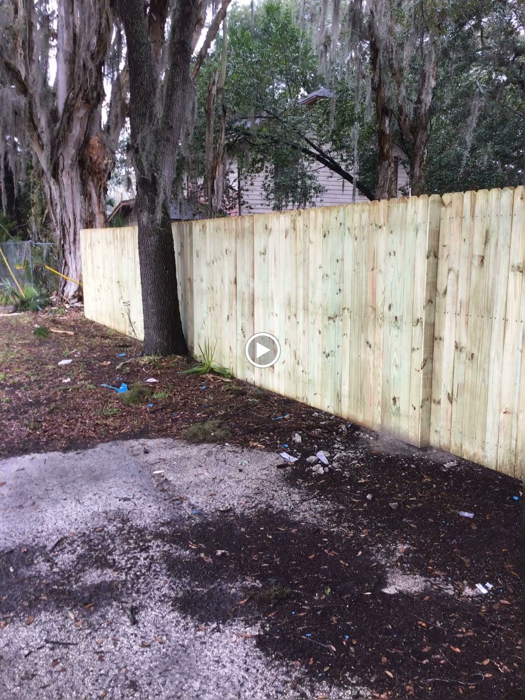 Wood Stockade fence installation in Tampa, FL — Vilo Fence