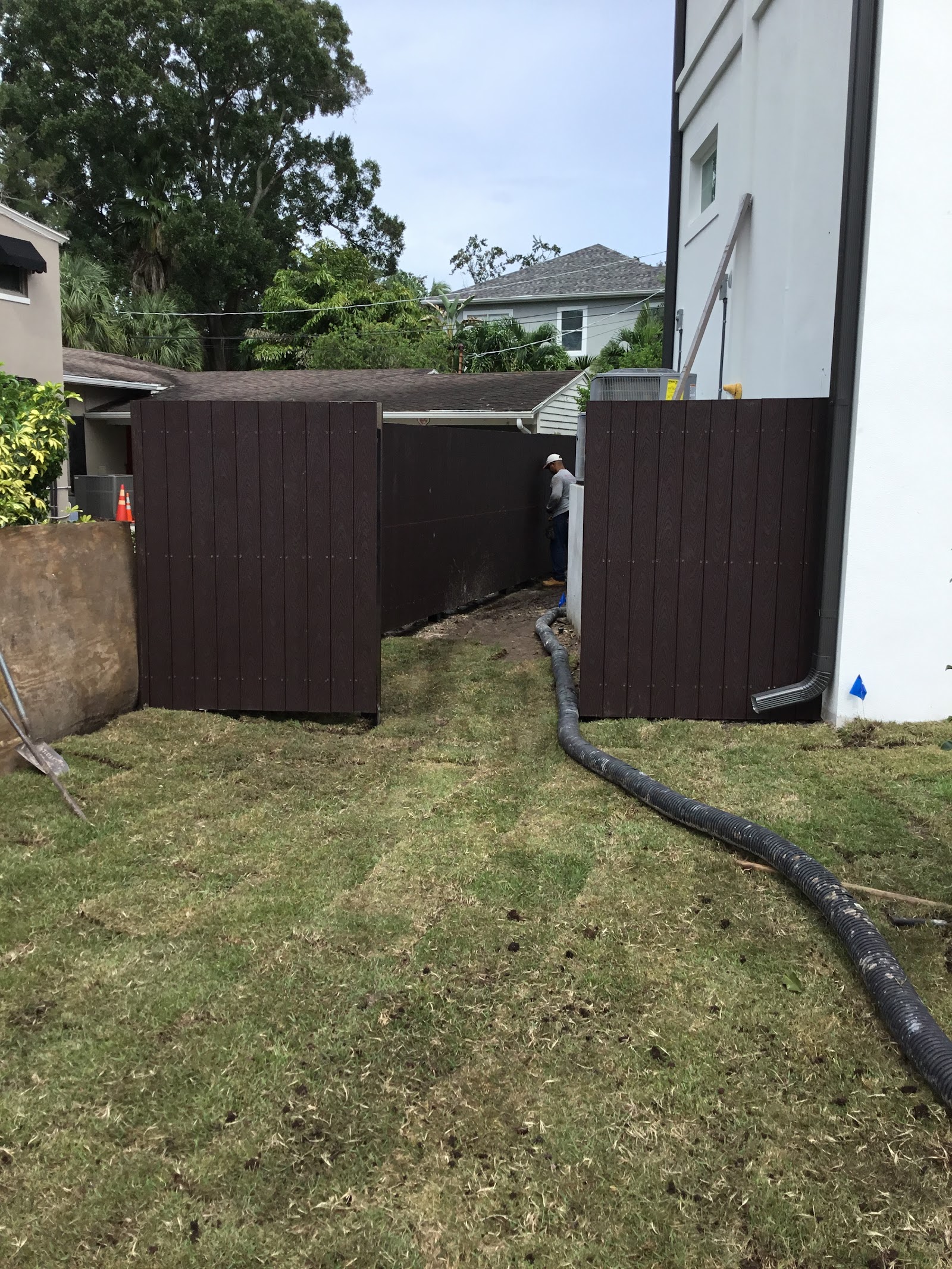 Wood Synthetic fence installation in Tampa, FL — Vilo Fence