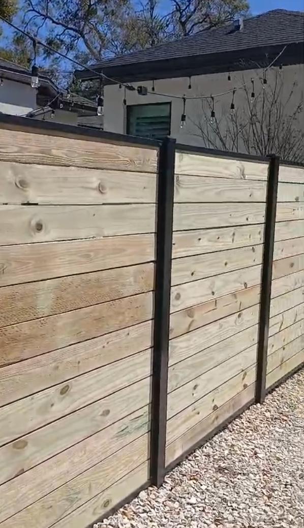 Wood Privacy Horizontal Metal Frame fence installation in Tampa, FL — Vilo Fence